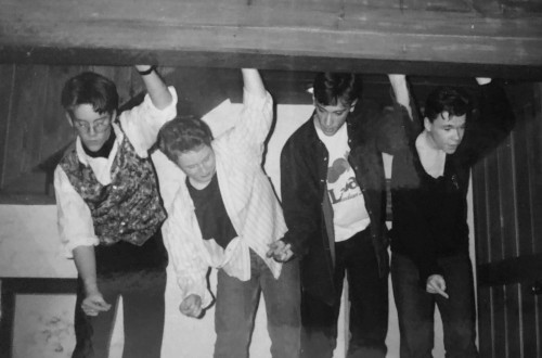 four slightly drunk teenagers in a band